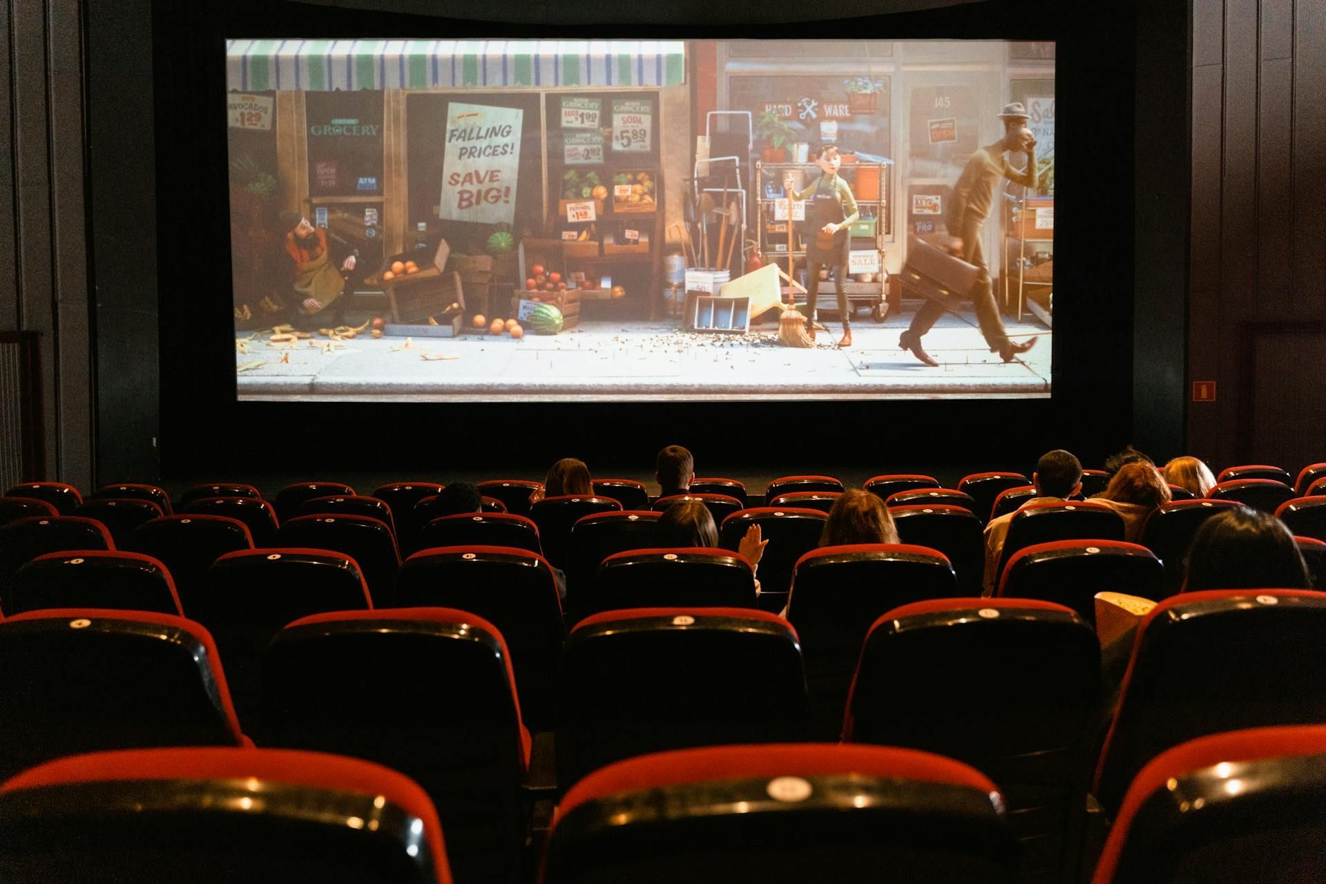 Cinema auditorium with an animated film projected on screen